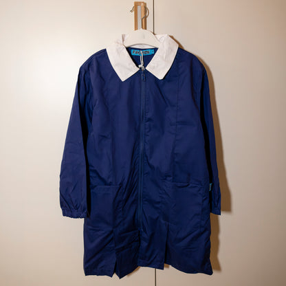 Grembiule blu con zip