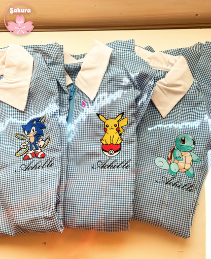 Grembiule a quadretti azzurro